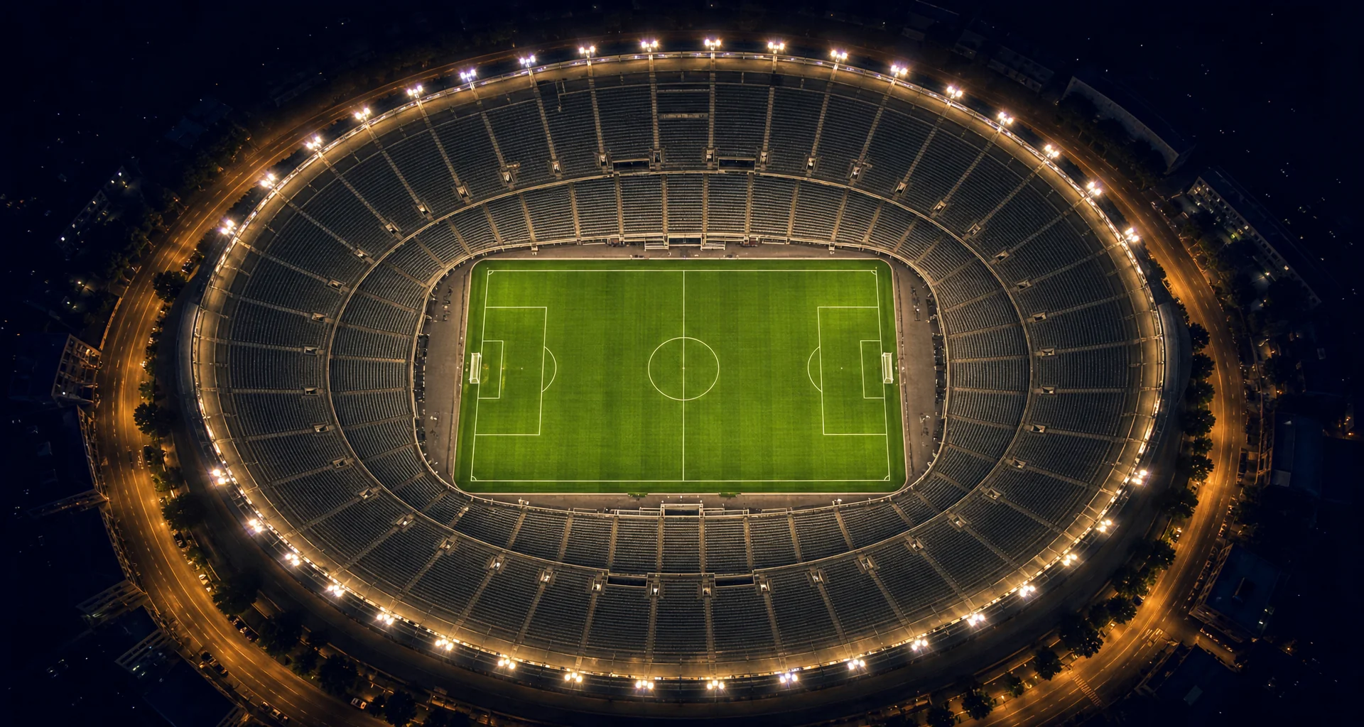 Stadium floodlights illuminating night sky